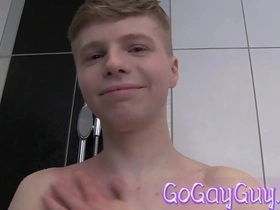 Cute soapy boy alone in a shower