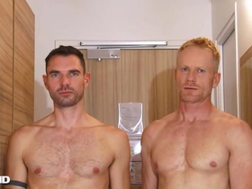 Handsome blonde fitness trainer serviced by a huge dick guy.